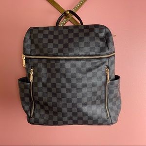 The Anistyn Checkered Horizontal Zip Backpack
